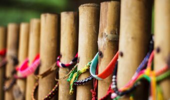 Bracelets dedicated to victims at the Choeung Ek mass grave in Cambodia